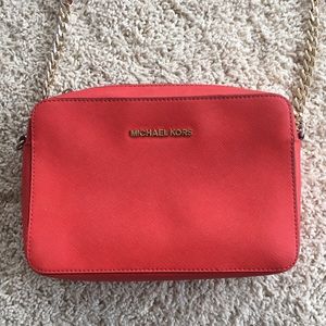 Michael Kors salmon colored crossbody bag
